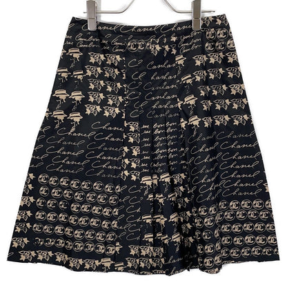Chanel 06c Black Beige Silk 100 Camellia CC Logo Icon Print Pleats Midi Skirt 36