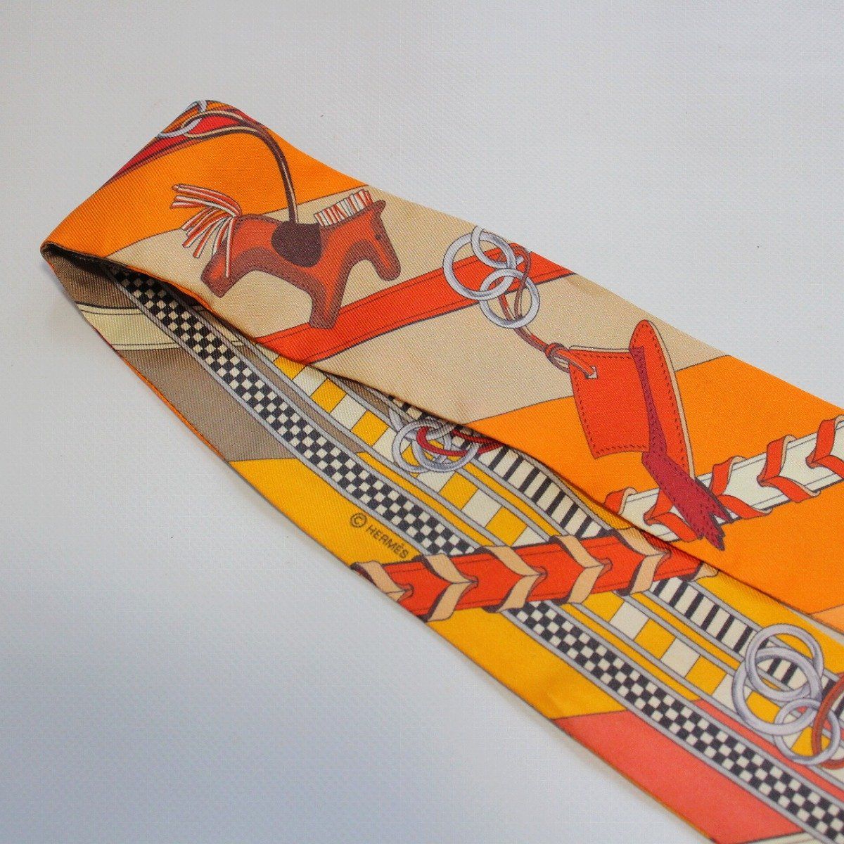 Hermes Twilly Bridle and Charm Silk 100% Orange Pawn Scarf — view 3