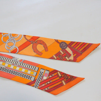 Hermes Twilly Bridle and Charm Silk 100% Orange Pawn Scarf — view 4