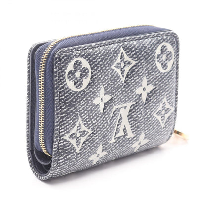 Louis Vuitton Bifold Wallet Portefeuille Monogram Embossed Navy Leather — view 2