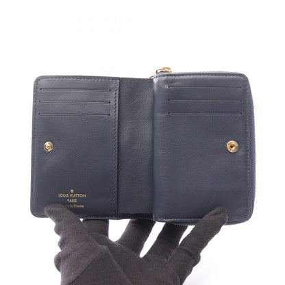 Louis Vuitton Bifold Wallet Portefeuille Monogram Embossed Navy Leather — view 3
