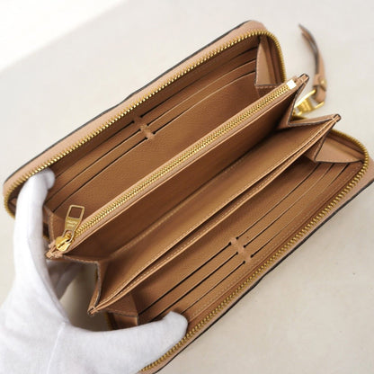 Louis Vuitton Wallet Monogram Empreinte Zippy Tourtore — view 3