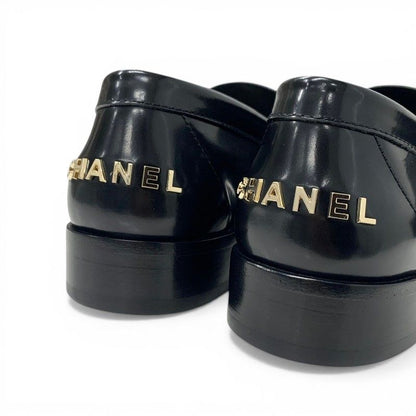 Chanel Loafers Leather Shoes Black Gold Logo Flat — view 9
