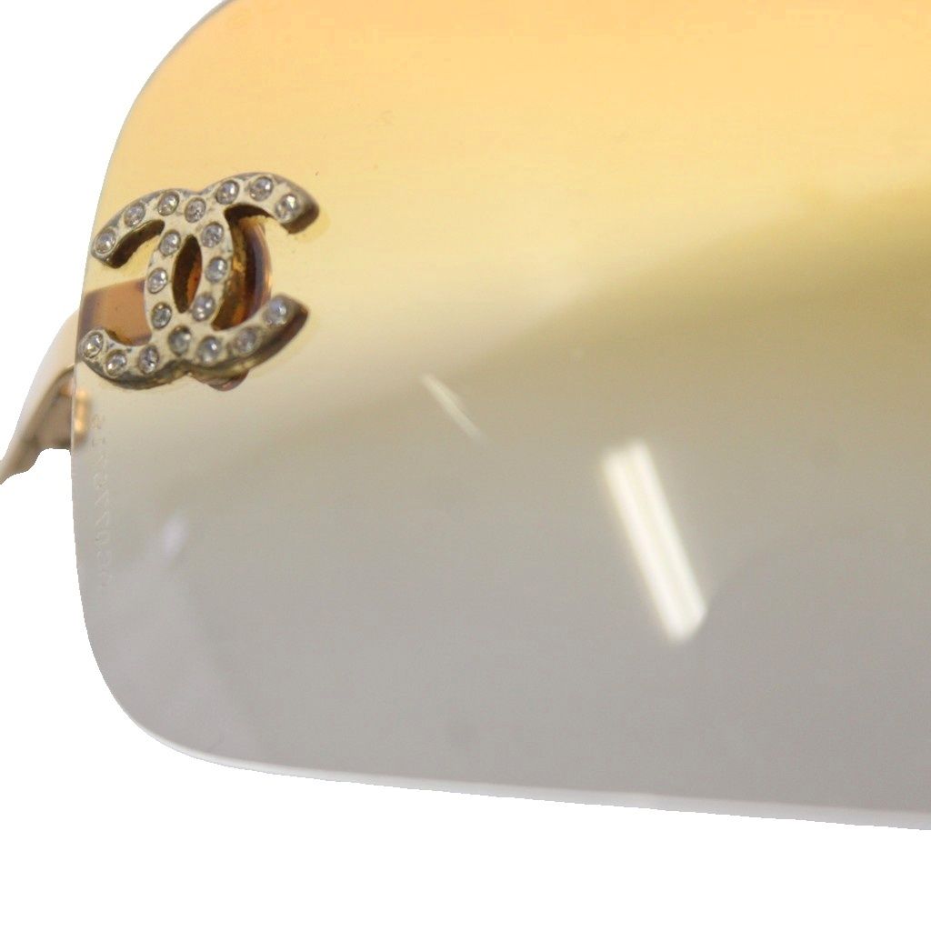 Chanel Sunglasses Metal Frame Rimless CC Logo Orange Lens Rhinestone Decoration — view 9
