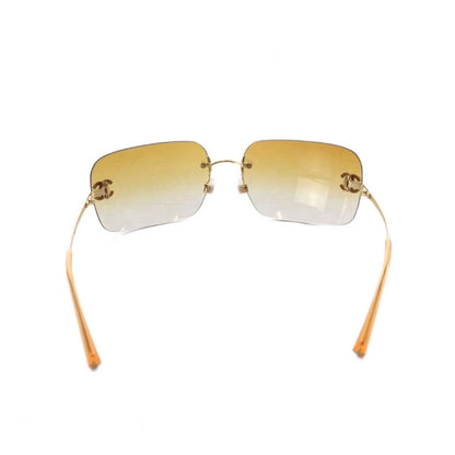 Chanel Sunglasses Metal Frame Rimless CC Logo Orange Lens Rhinestone Decoration — view 4
