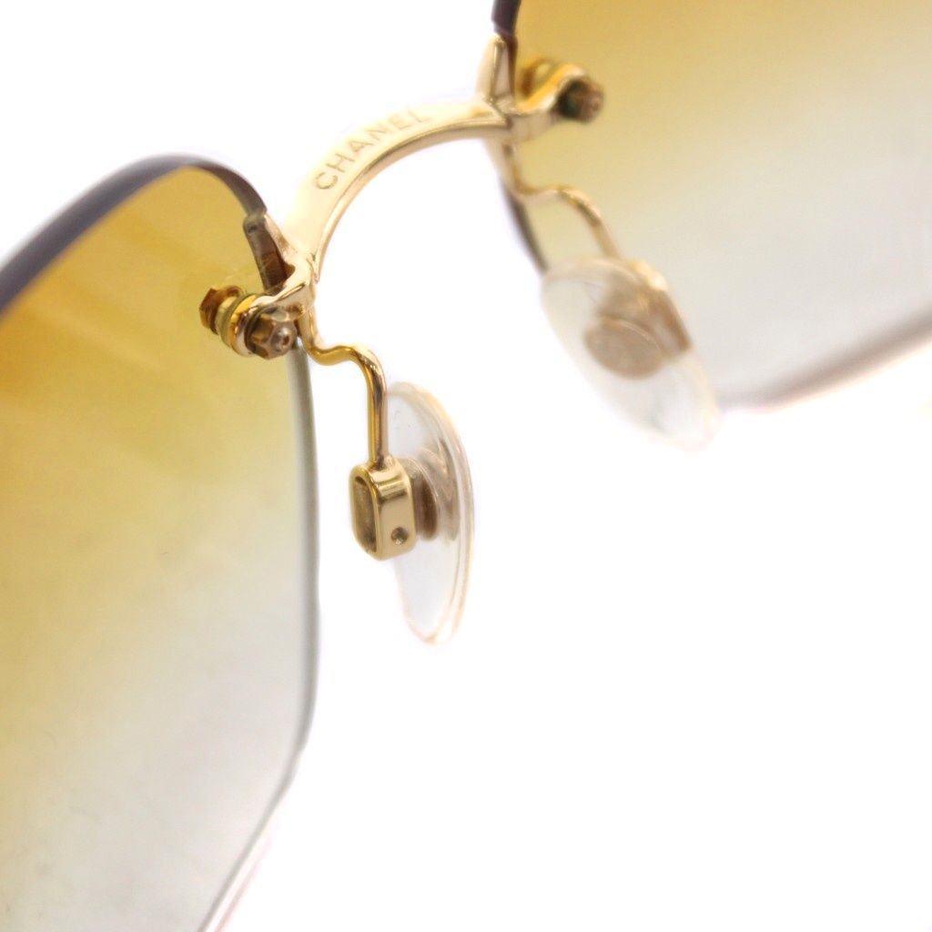 Chanel Sunglasses Metal Frame Rimless CC Logo Orange Lens Rhinestone Decoration — view 6