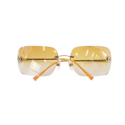 Chanel Sunglasses Metal Frame Rimless CC Logo Orange Lens Rhinestone Decoration