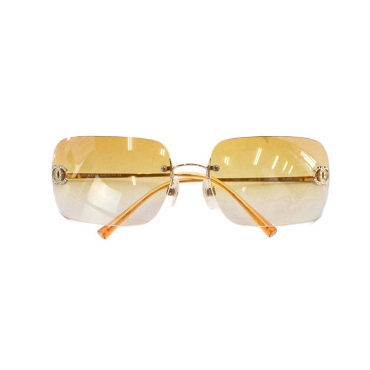 Chanel Sunglasses Metal Frame Rimless CC Logo Orange Lens Rhinestone Decoration