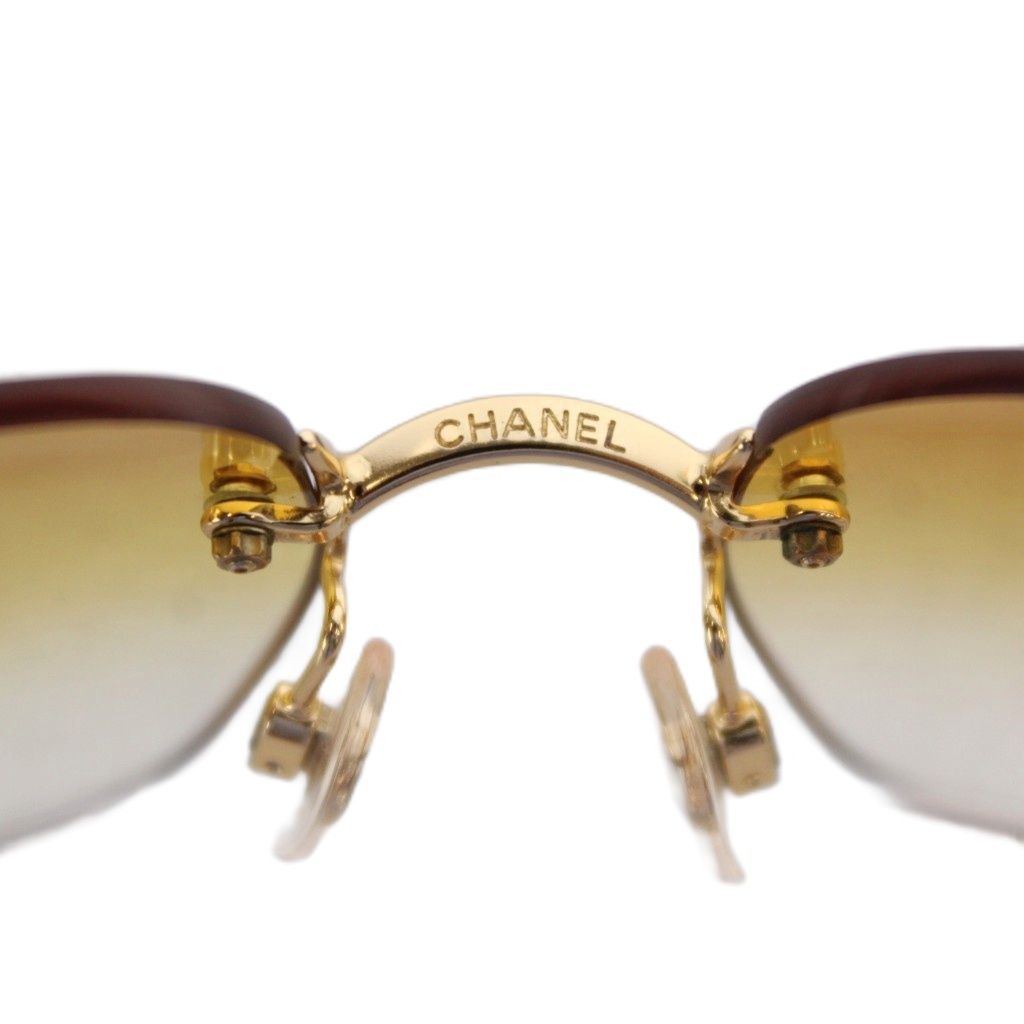 Chanel Sunglasses Metal Frame Rimless CC Logo Orange Lens Rhinestone Decoration — view 7