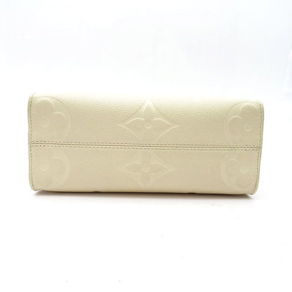Louis Vuitton On The Go PM Monogram Empreinte Handbag Cles — view 6