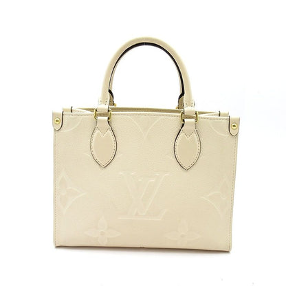 Louis Vuitton On The Go PM Monogram Empreinte Handbag Cles