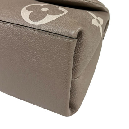 Louis Vuitton Madeleine MM Bicolor Monogram Empreinte Shoulder Bag Beige — view 9