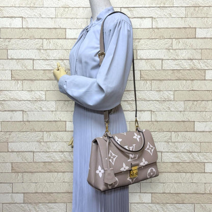 Louis Vuitton Madeleine MM Bicolor Monogram Empreinte Shoulder Bag Beige — view 2