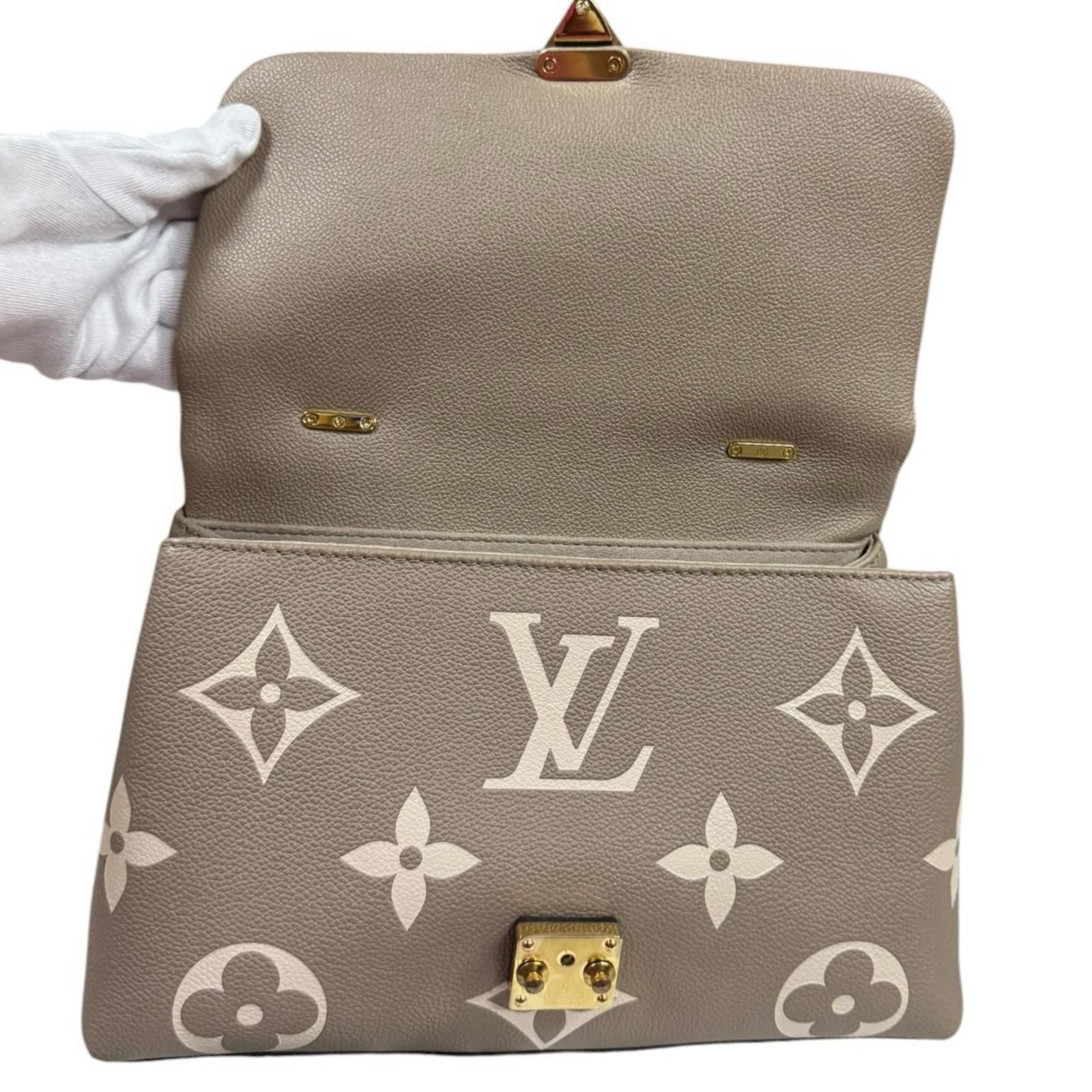 Louis Vuitton Madeleine MM Bicolor Monogram Empreinte Shoulder Bag Beige — view 8
