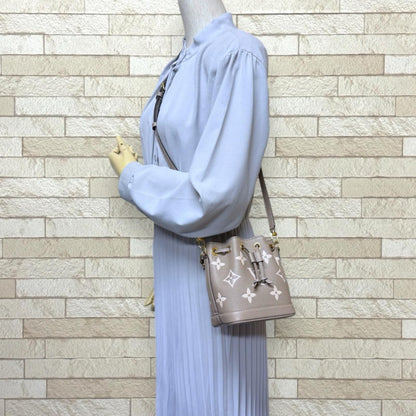 Louis Vuitton Nano Noe Bicolor Monogram Empreinte Shoulder Bag Beige — view 2
