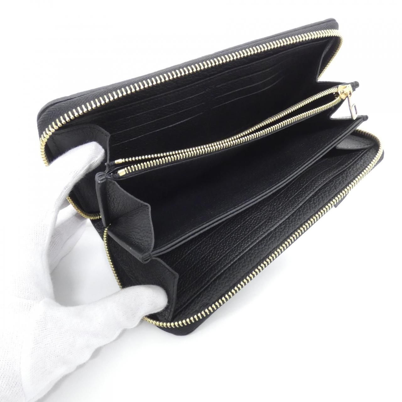 Louis Vuitton Monogram Empreinte Zippy Wallet — view 7