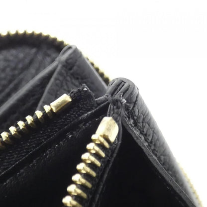 Louis Vuitton Monogram Empreinte Zippy Wallet — view 8