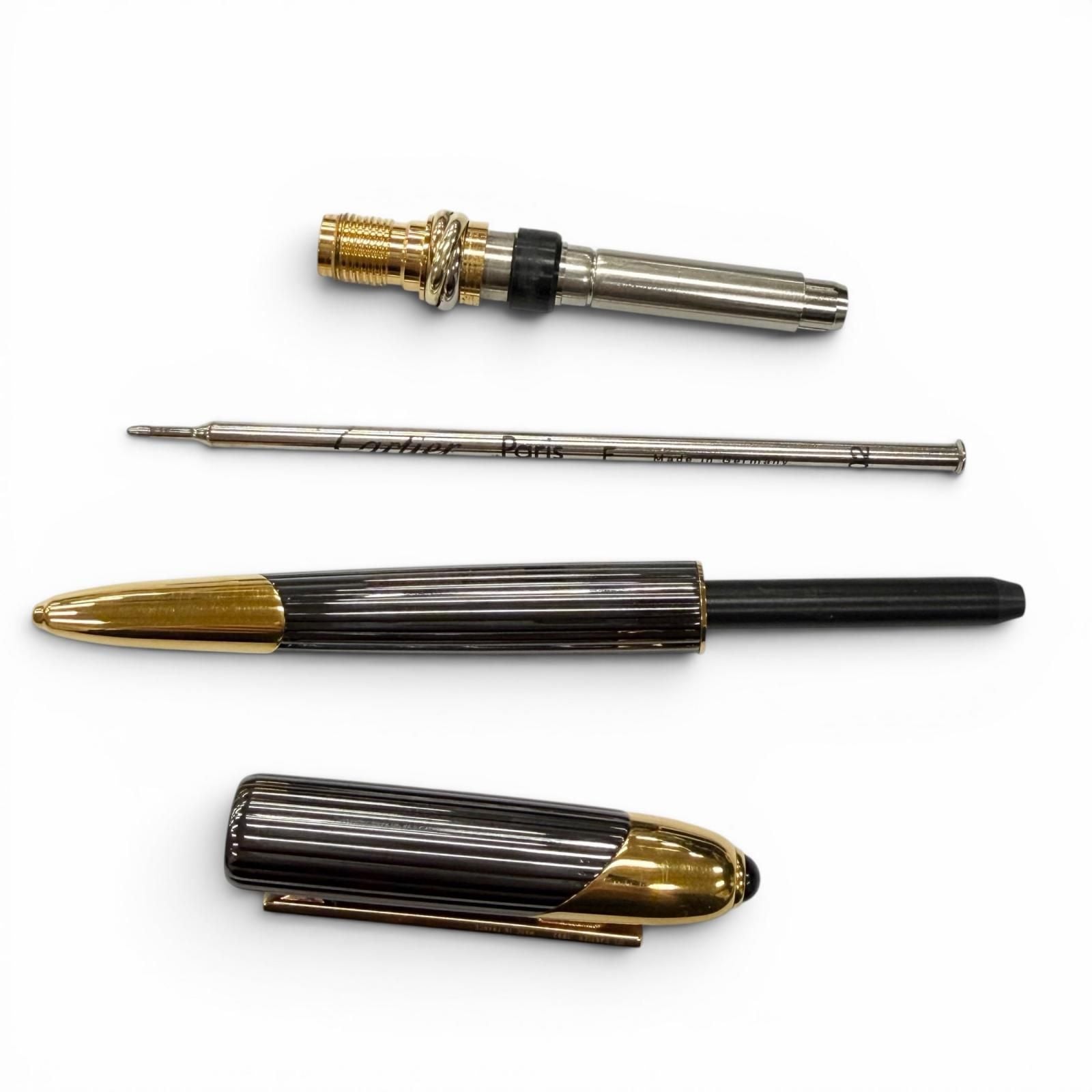 Cartier Trinity Color Stone Twist Ballpoint Pen Black Gold Handwriting Confirmed — view 4