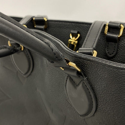 Louis Vuitton Tote Monogram Empreinte On The Go MM Noir 2-Way — view 8