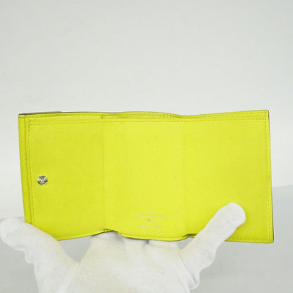 Louis Vuitton Trifold Wallet Taigarama Discovery Compact Jaune — view 3