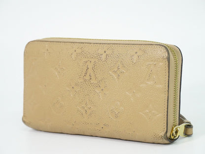 Louis Vuitton LV Zippy Wallet Monogram Empreinte Leather Beige — view 2