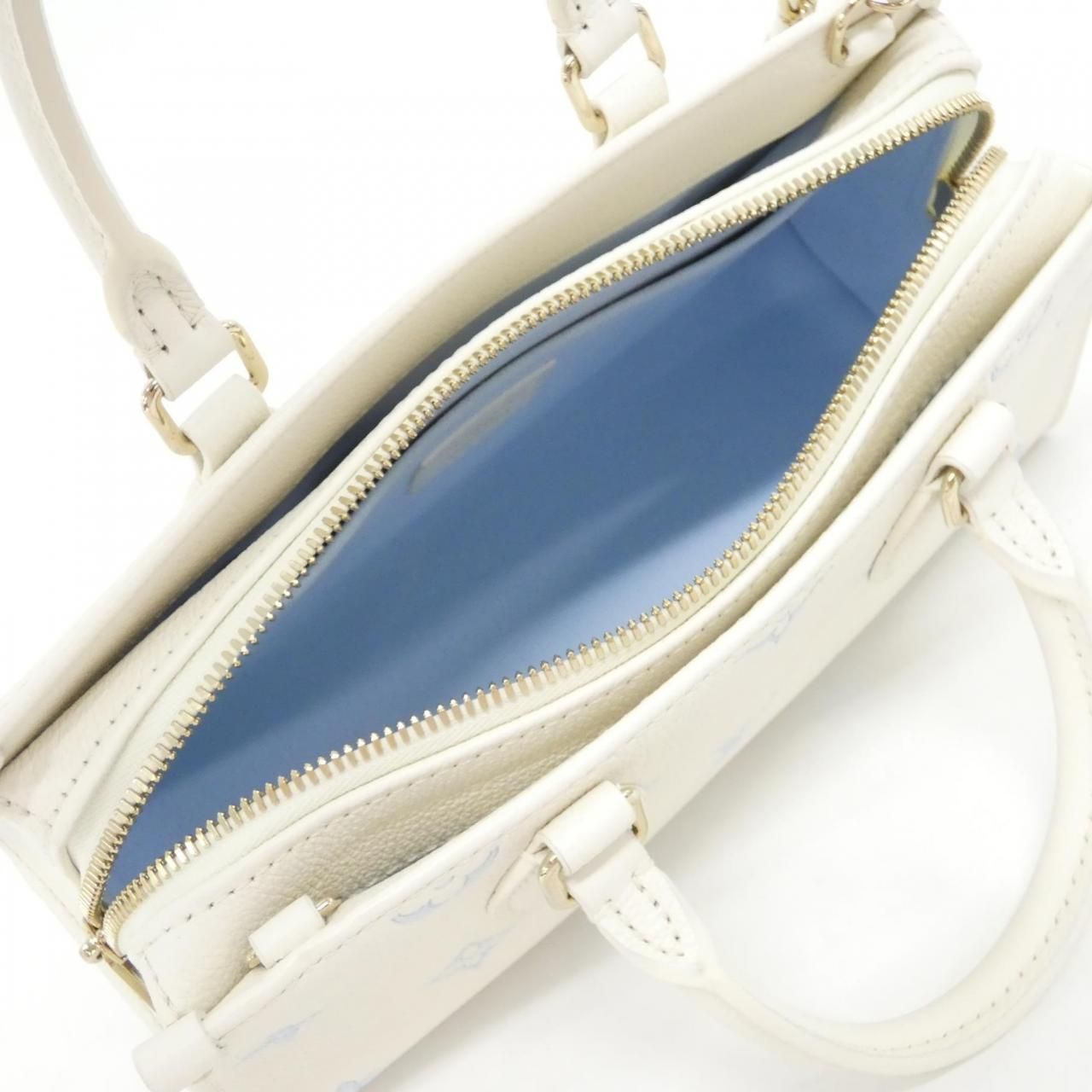 Louis Vuitton Bicolor Monogram Empreinte On The Go East West — view 5