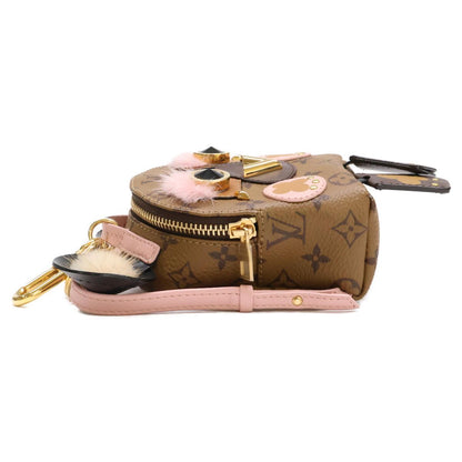 Louis Vuitton Bijou Sac Wild Puppet Monogram Reverse Canvas Mink Bag Charm — view 4