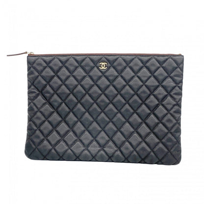 Chanel Clutch Quilted Caviar Leather Black Champagne Gold