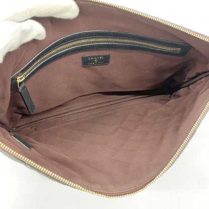 Chanel Clutch Quilted Caviar Leather Black Champagne Gold — view 4