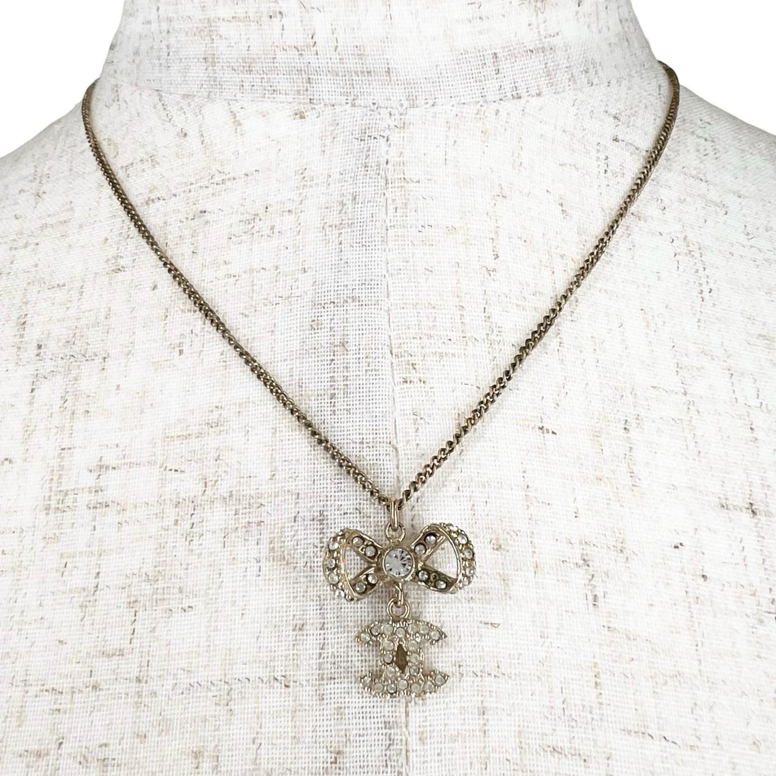 Chanel CC Logo Ribbon Motif Metal Gold Necklace — view 3