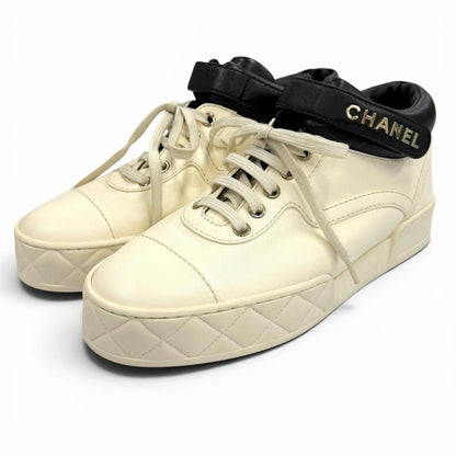 Chanel Logo with CC Lace Up Leather Sneakers Ivory Black