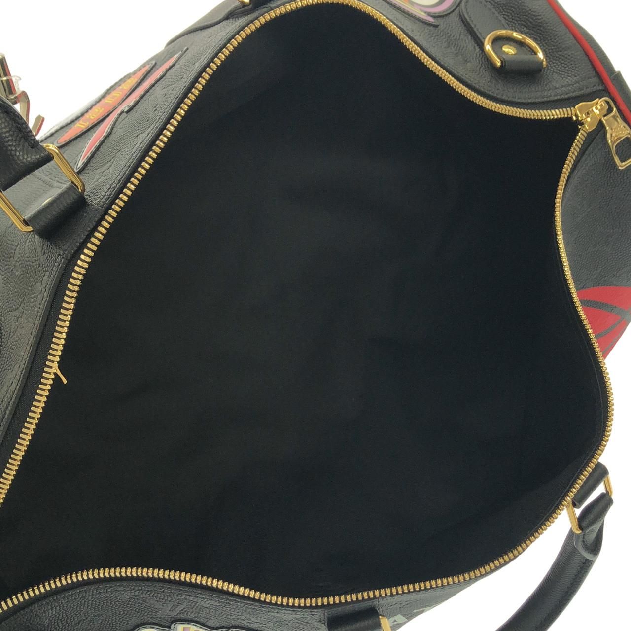 Louis Vuitton Monogram Keepall Bandouliere 55 cm Boston — view 7