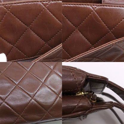 Chanel Quilted Handbag CC Logo Lambskin Brown Gold — view 9