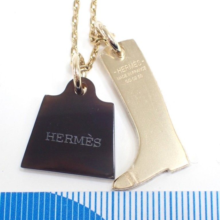 Hermes Necklace Amulet Marokinier Gold Brown Metal Buffalo Horn Boots Motif — view 3