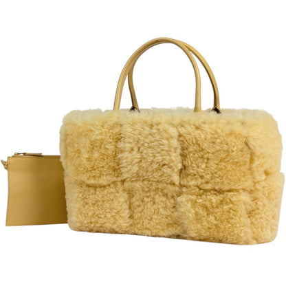 Bottega Veneta Small Arco Tote Intrecciato Shearling Yellow