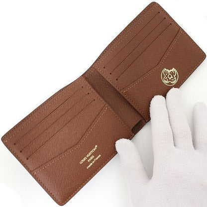 Louis Vuitton Portefeuille Calf Bifold Wallet Monogram Donut Canvas Chocolate — view 5