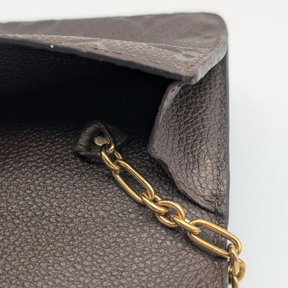 Louis Vuitton Pochette Cles Monogram Empreinte Tail Brown Leather Coin Case — view 8