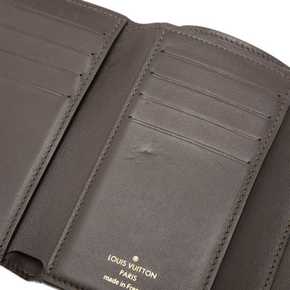 Louis Vuitton Portefeuille Capucines Compact Trifold Wallet Gale Beige Taurillon — view 4