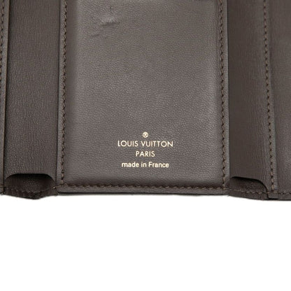 Louis Vuitton Portefeuille Capucines Compact Trifold Wallet Gale Beige Taurillon — view 7