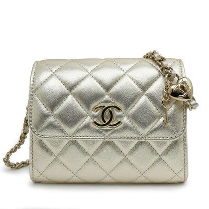 Chanel Quilted Mini Clutch Heart Charm Champagne Gold Chain