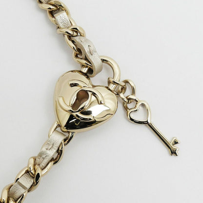 Chanel Quilted Mini Clutch Heart Charm Champagne Gold Chain — view 7