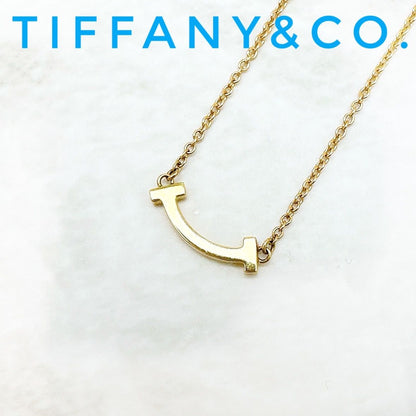 Tiffany & Co T Smile Mini Yellow Gold Necklace