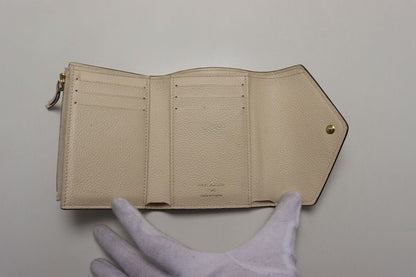 Louis Vuitton Monogram Empreinte Portefeuille Victorine Bicolor Leather Trifold — view 4