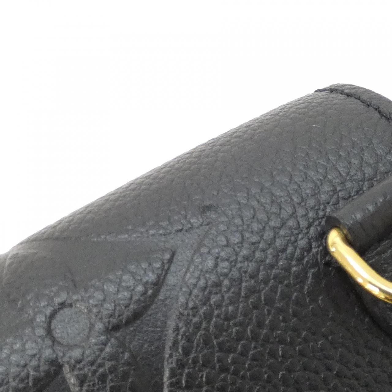 Louis Vuitton Monogram Empreinte Tiny Backpack — view 5