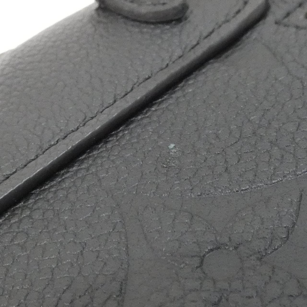 Louis Vuitton Monogram Empreinte Tiny Backpack — view 6