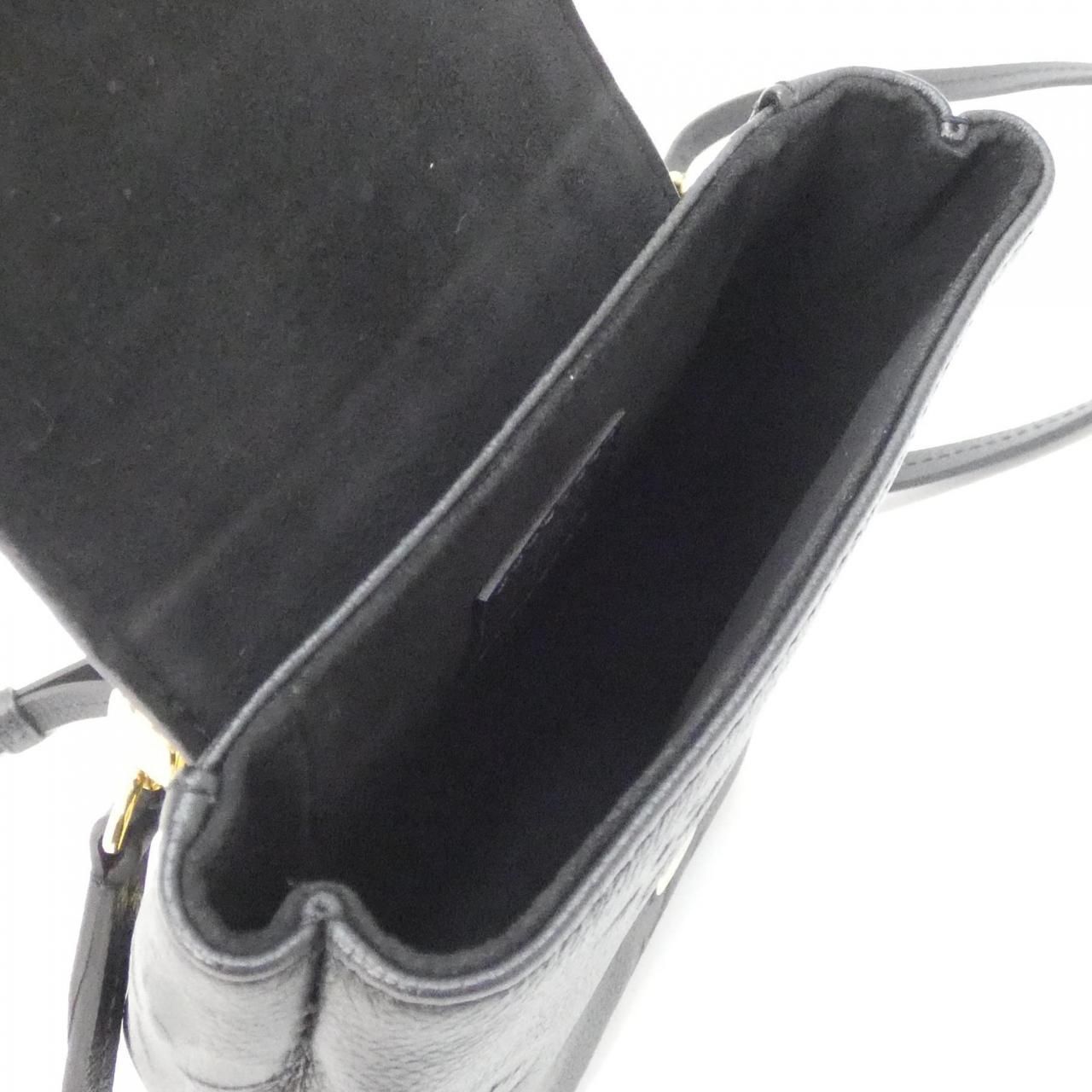 Louis Vuitton Monogram Empreinte Tiny Backpack — view 9