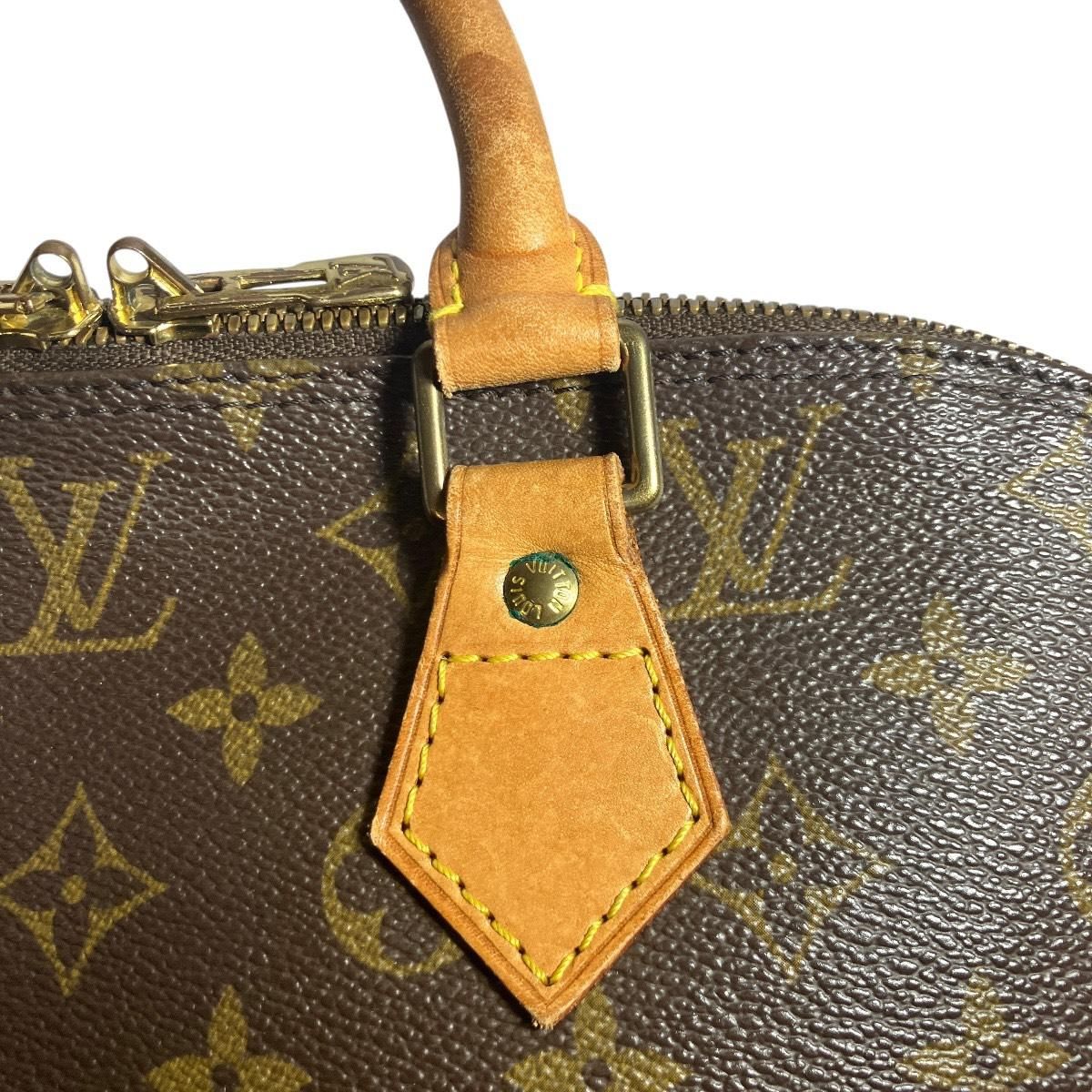 Louis Vuitton Alma Monogram Handbag Canvas — view 9