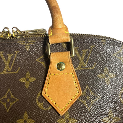 Louis Vuitton Alma Monogram Handbag Canvas — view 9