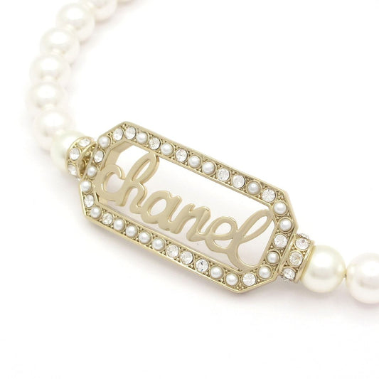 Chanel Choker Gold Ivory Clear Logo Necklace