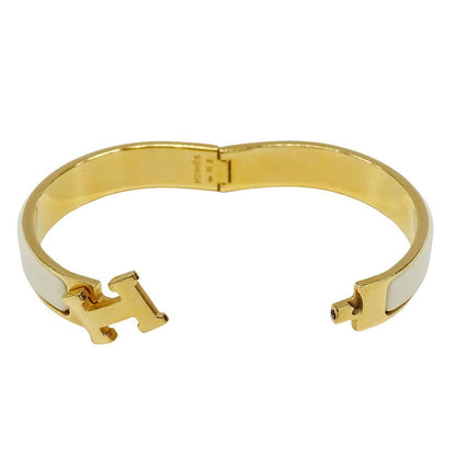 Hermes Bangle Click Enamel Metal Yellow Gold Ivory Logo Adult Bracelet — view 5